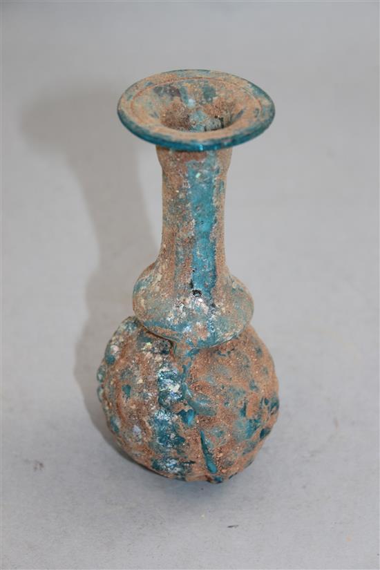 A Roman turquoise glass grape flask, Syria 1st / 2nd century AD, 13.5cm